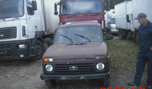 Лот №26. Легковой специальный внедорожник универсал Lada 21214 и материалы